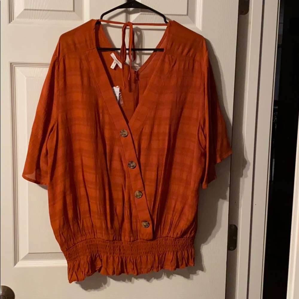 button up orange blouse